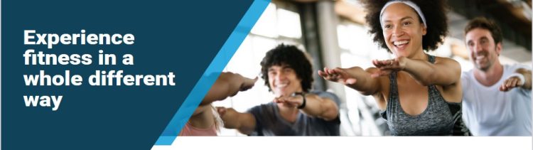 Group fitness class with diverse participants smiling and doing squats. Experience fitness in a whole different way.