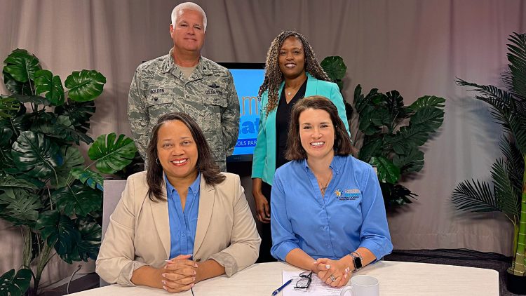 Group Photo Family School Partnerships Group photo of four people, including a military member, promoting family and school partnerships.