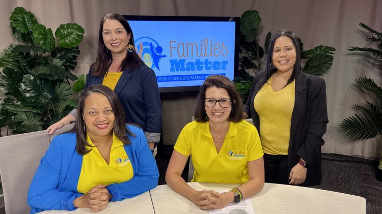 Families Matter Public Schools Parenting Four women in yellow and blue "Families Matter" shirts pose for a photo.